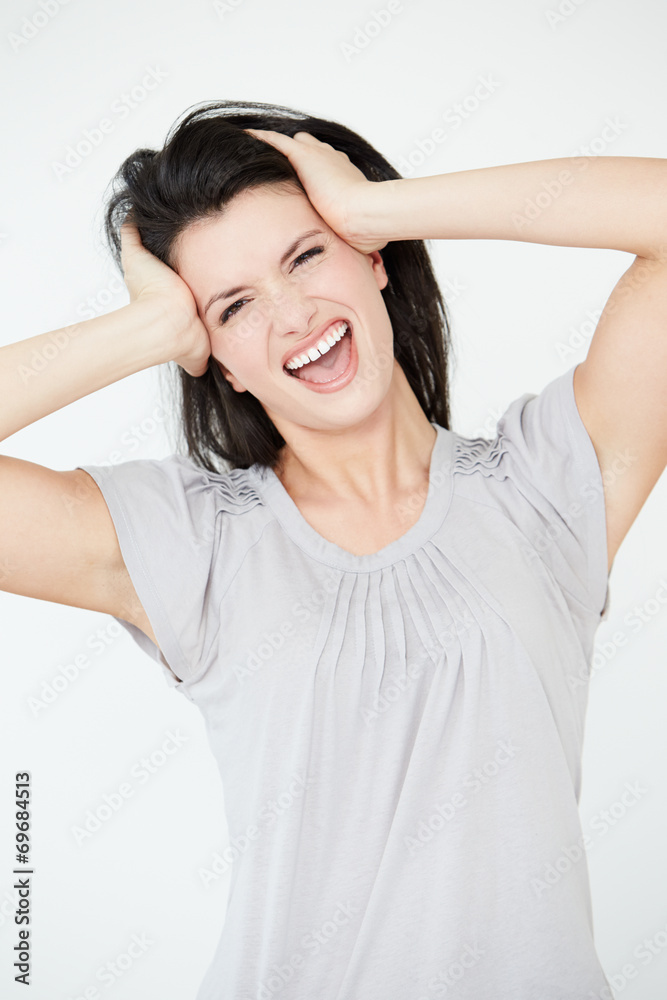 Studio Portrait Of Stressed Woman Against White Background Studio Portrait Of Stressed Woman Against White Background
