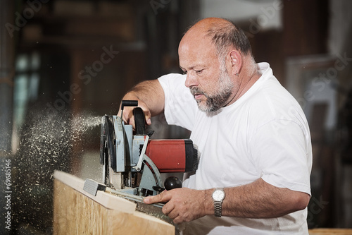Carpenter with Circular Hand Saw