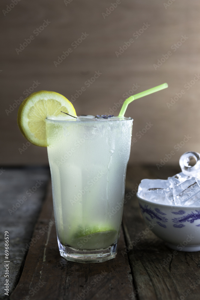 Glass of fresh lemonade with ice cubes Glass of fresh lemonade with ice cubes