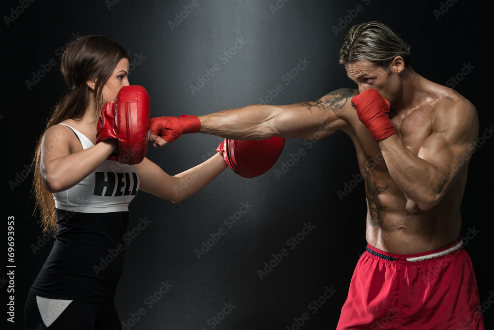 A Young Couple Boxing For Fitness