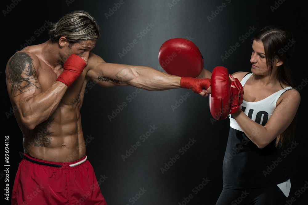 Young Fit Man Fighting A Woman