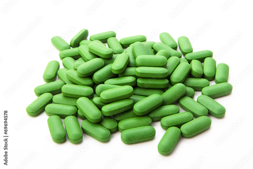 Stack of green pills Stack of green pills