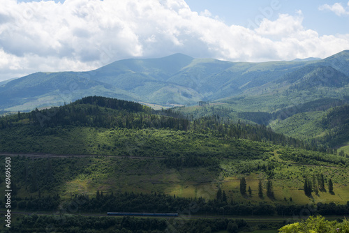 Landscape in the Ukrainian Carpathians with the passenger train