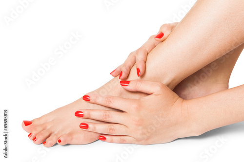 Woman with beautiful red finger and toenails