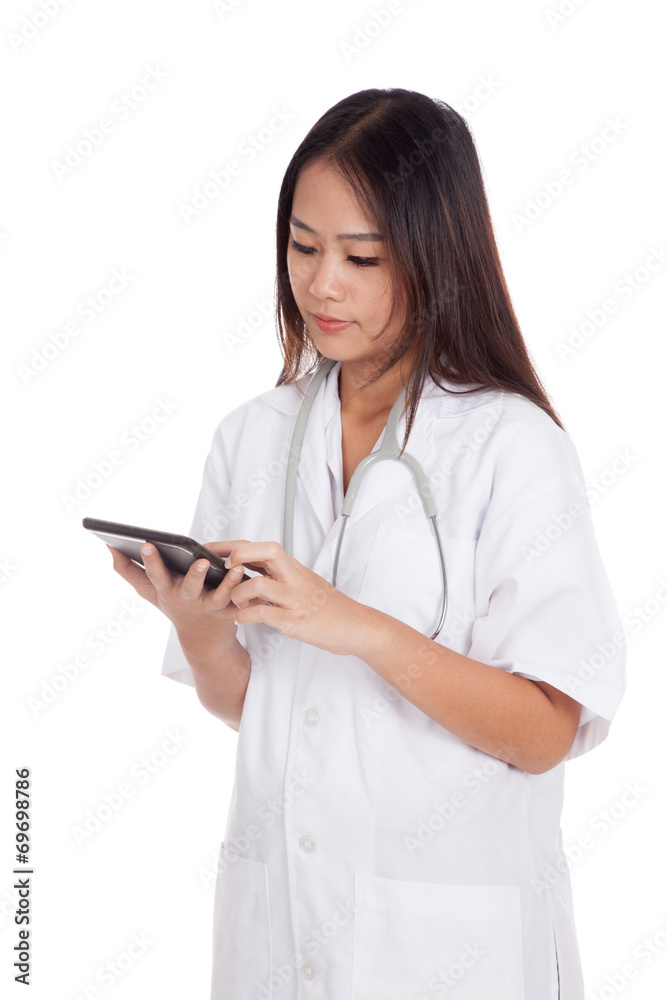 Asian young female doctor look at a tablet pc Asian young female doctor look at a tablet pc