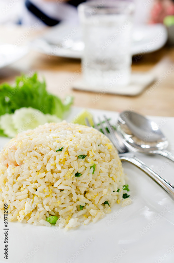 Macro Fried rice thai style on white plate . Macro Fried rice thai style on white plate .