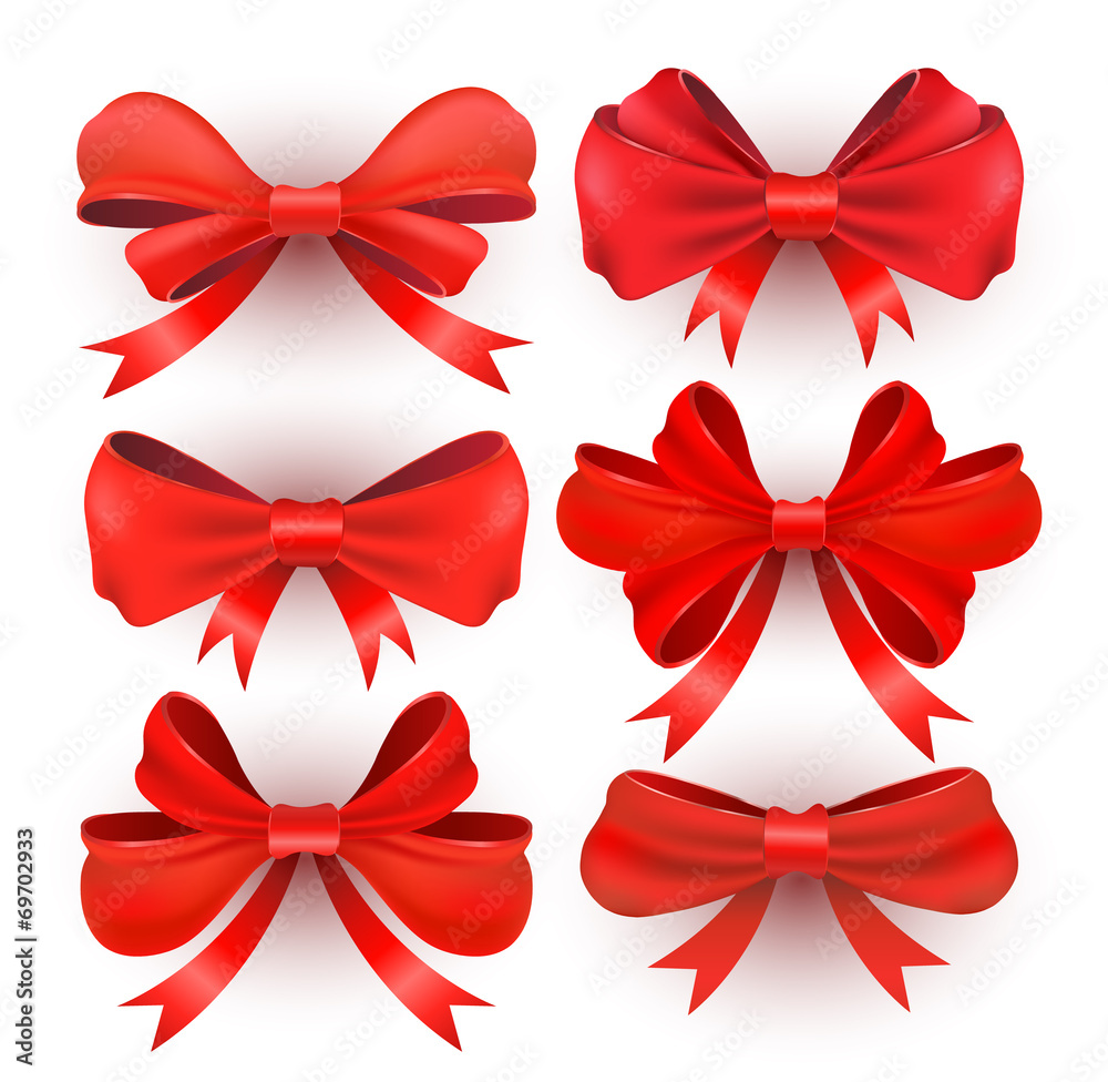 Red gift bows with ribbons.