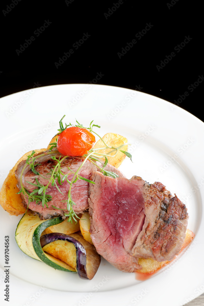 Juicy grilled bbq steaks with fresh herbs, vegetable Juicy grilled bbq steaks with fresh herbs, vegetable