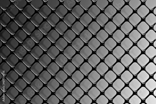 Steel grating on a gray background.