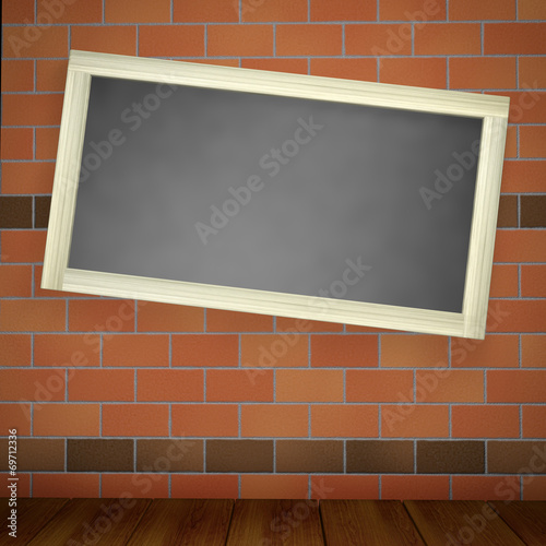 blackboard on a brick wall