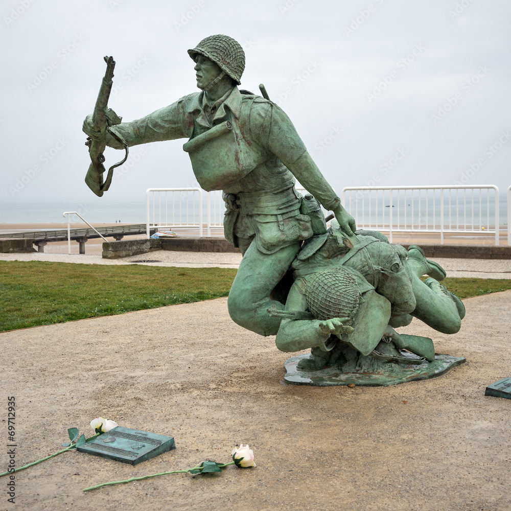 Soldier statue memorial. Omaha beach, France. Stock Photo Adobe Stock