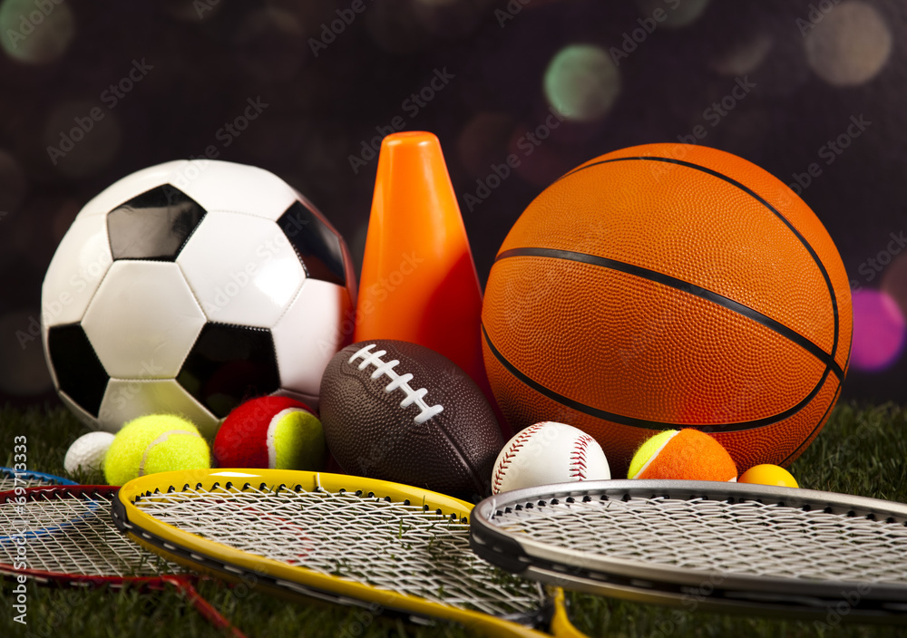 Assorted sports equipment and grass