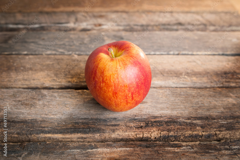 red apples on wooden table red apples on wooden table