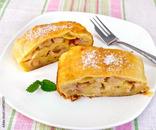 Strudel with pears on tablecloth