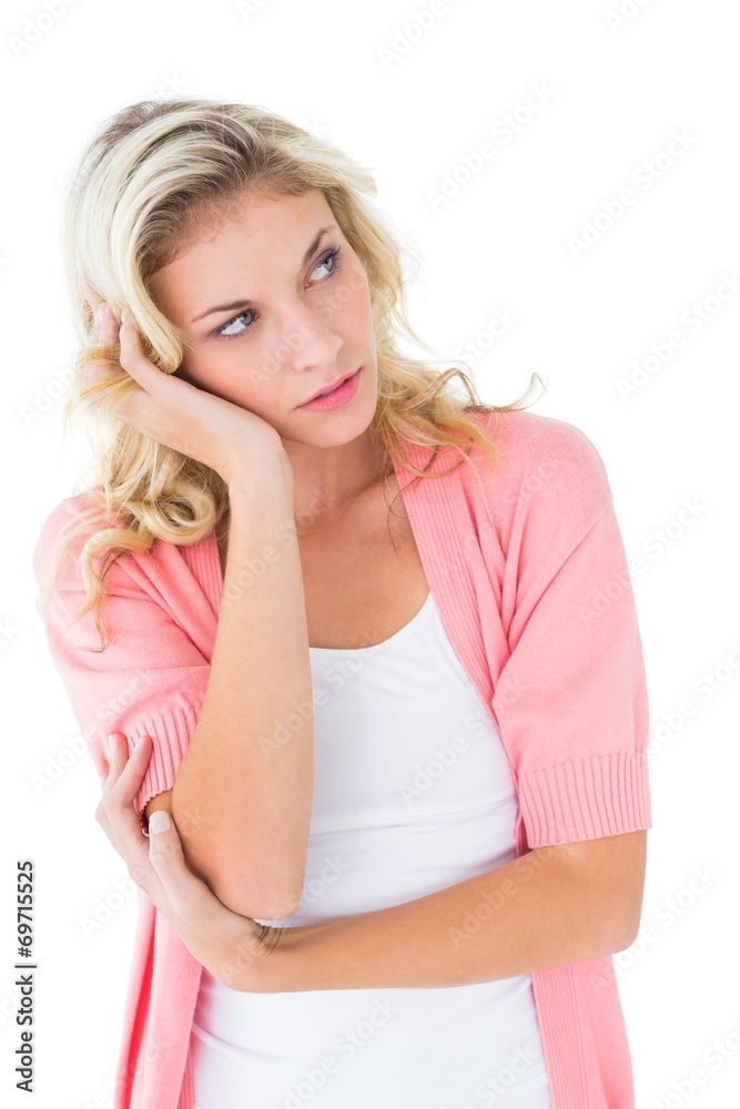 Pretty young blonde thinking with hand on head Pretty young blonde thinking with hand on head