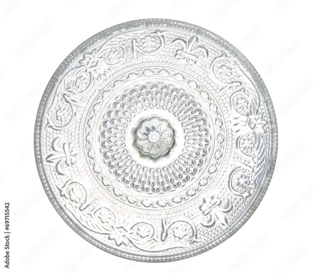 plate made of transparent glass with patterns, isolated on white
