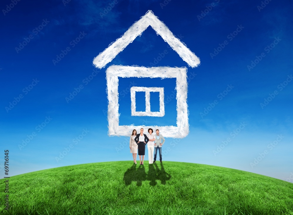 Composite image of business team looking at camera