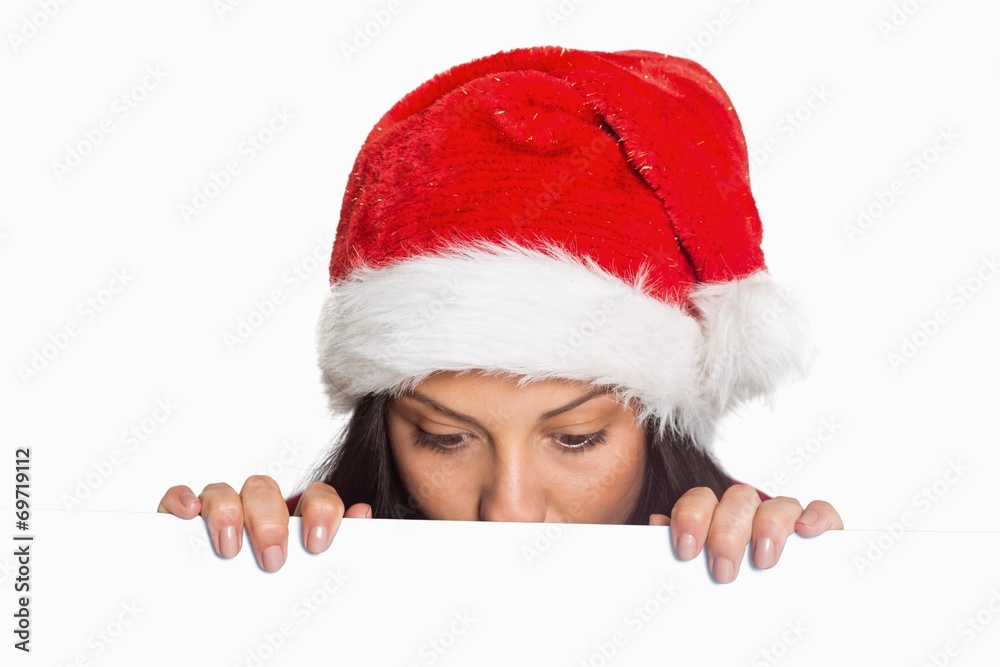 Woman looking at something below Woman looking at something below