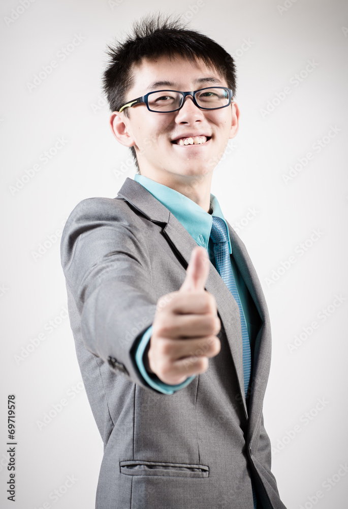 Successful young business man of Asian, full length portrait iso Successful young business man of Asian, full length portrait iso