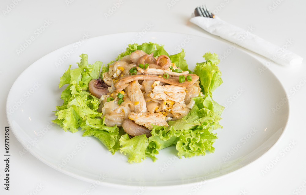 Stir fried fresh rice-flour noodles with chicken and egg.