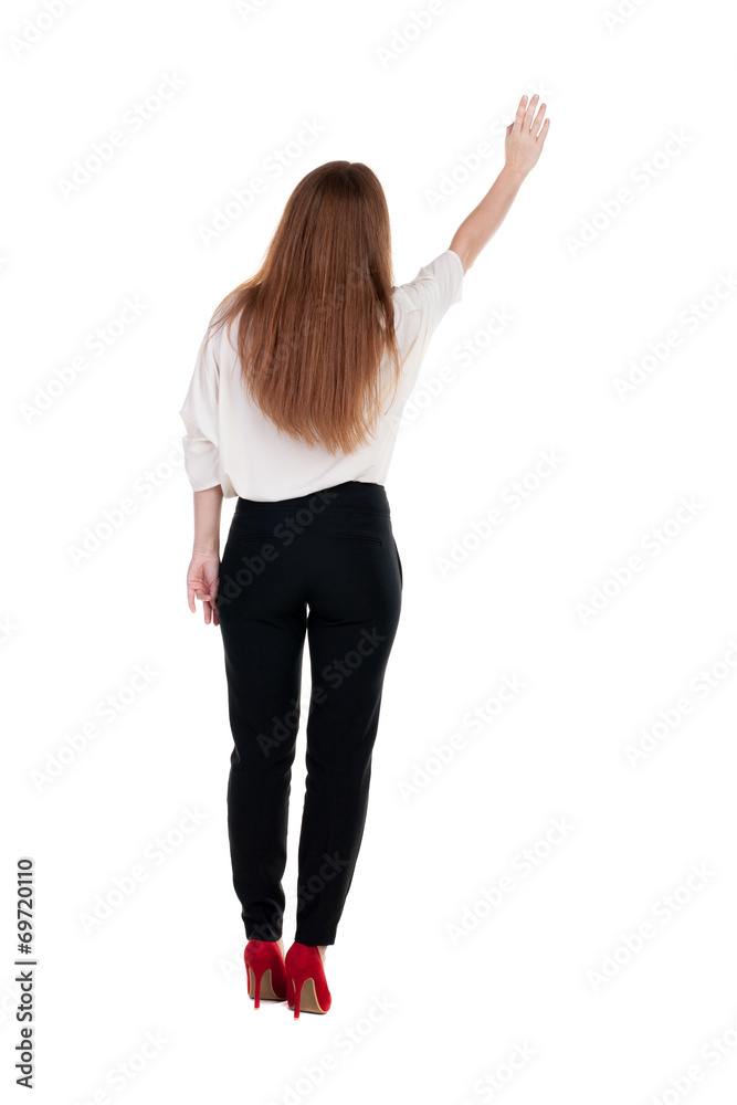 Back view of beautiful business woman welcomes. Back view of beautiful business woman welcomes.