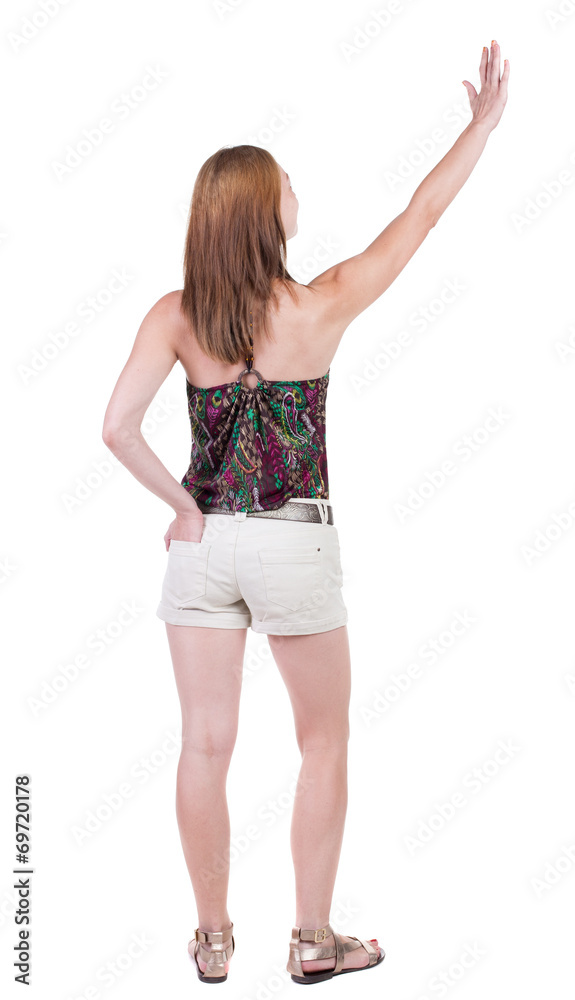 Back view of beautiful woman welcomes. Back view of beautiful woman welcomes.