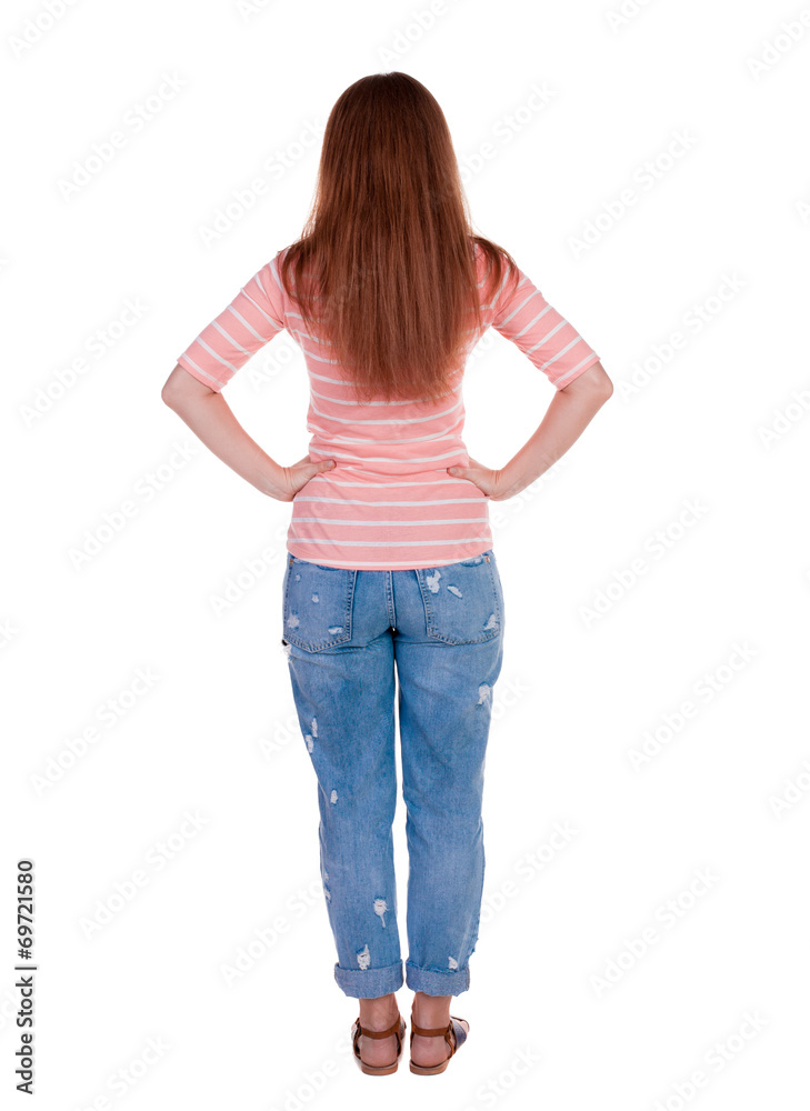back view of standing young beautiful redhead woman. back view of standing young beautiful redhead woman.