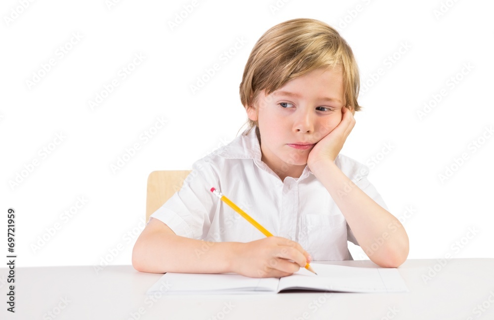 Worried student doing some homework Worried student doing some homework