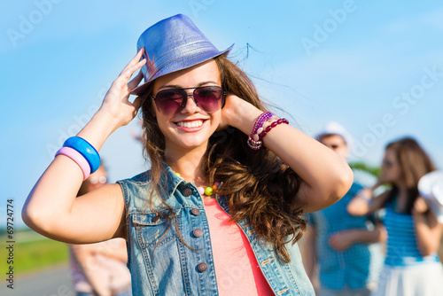 stylish young woman in sunglasses