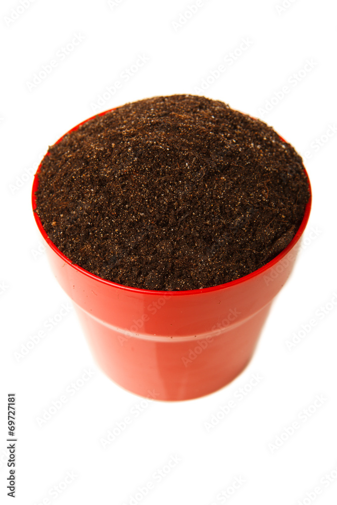 soil in the red pot, isolated on white soil in the red pot, isolated on white