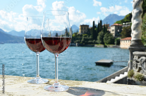Two wineglasses. Varenna town at the lake Como, Italy