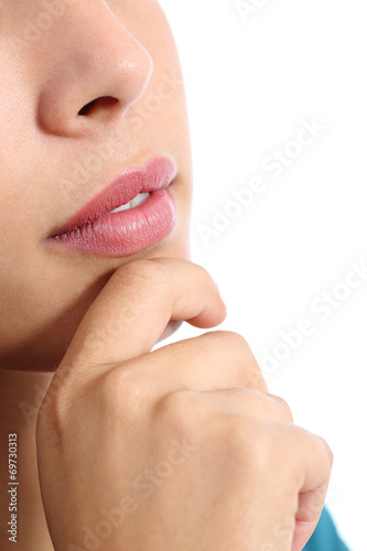 Close up of a pensive woman thinking
