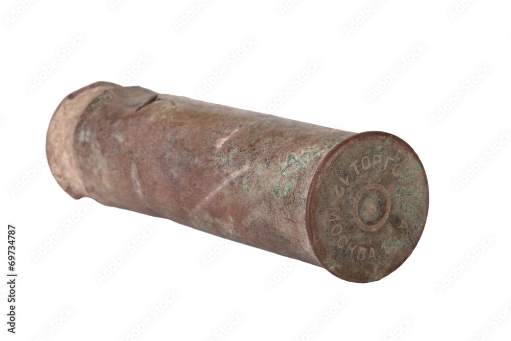 old brass case of hunting cartridge isolated on white background old brass case of hunting cartridge isolated on white background