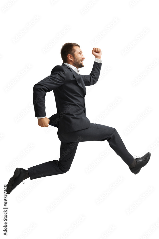 laughing businessman running