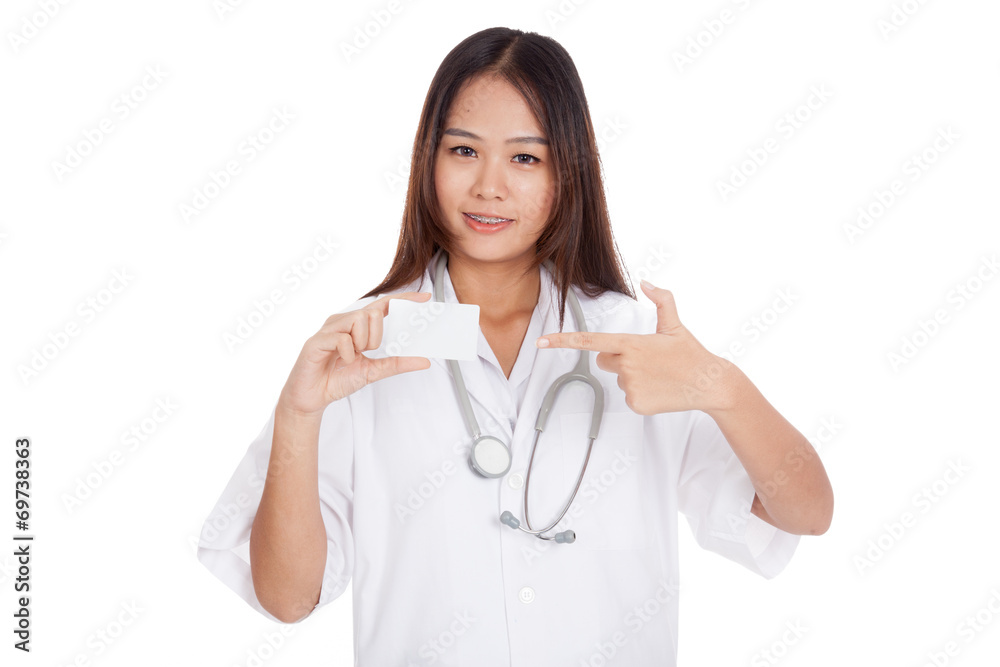 Asian young female doctor point to blank card Asian young female doctor point to blank card
