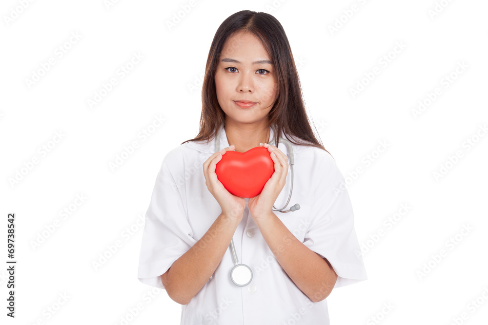 Asian young female doctor hold a red heart Asian young female doctor hold a red heart