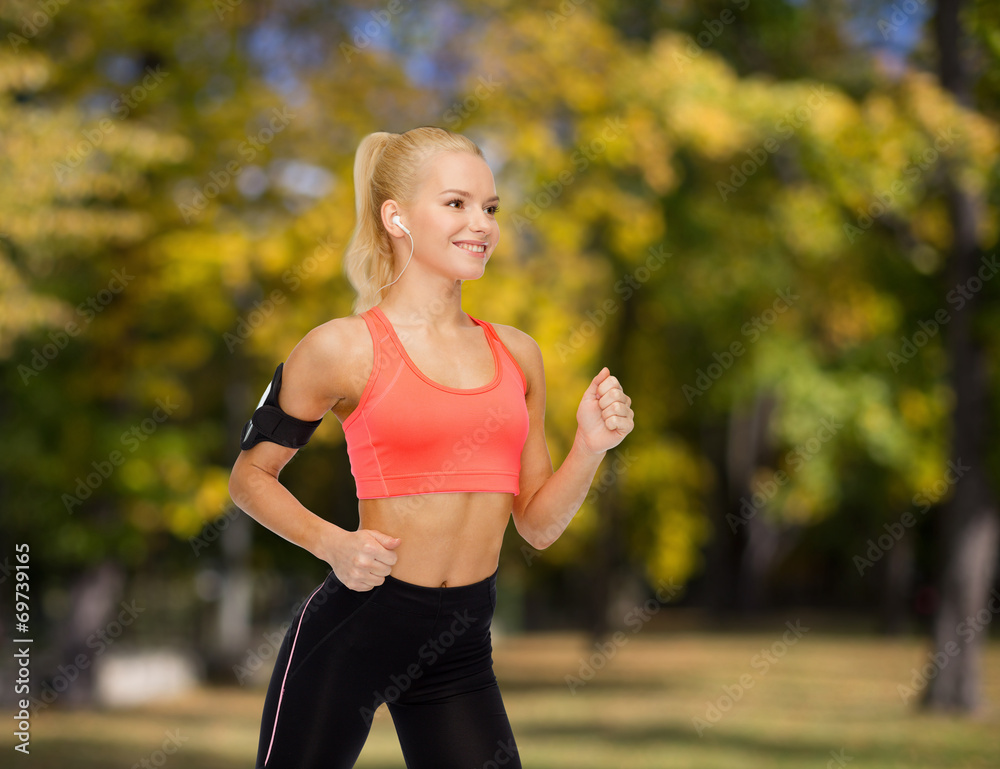 sporty woman running with smartphone and earphones sporty woman running with smartphone and earphones