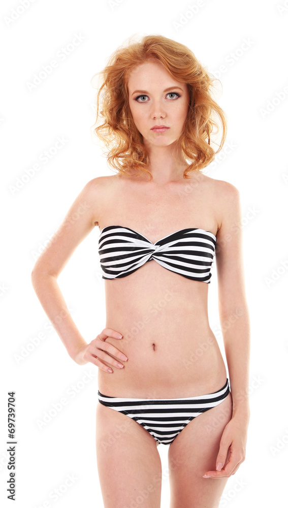 Young woman with slim body in swimsuit isolated on white Young woman with slim body in swimsuit isolated on white
