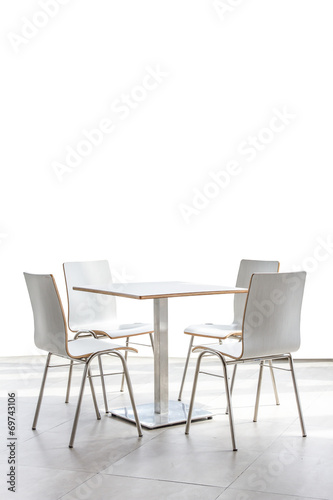 tables and chairs set on floor