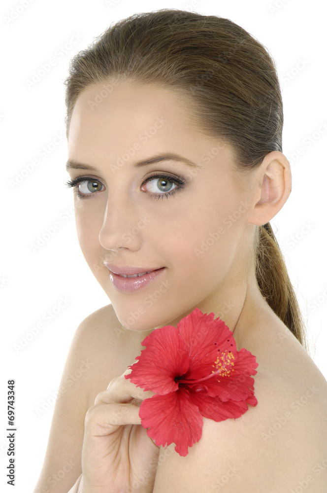 Sexy girl holding flower in her hands