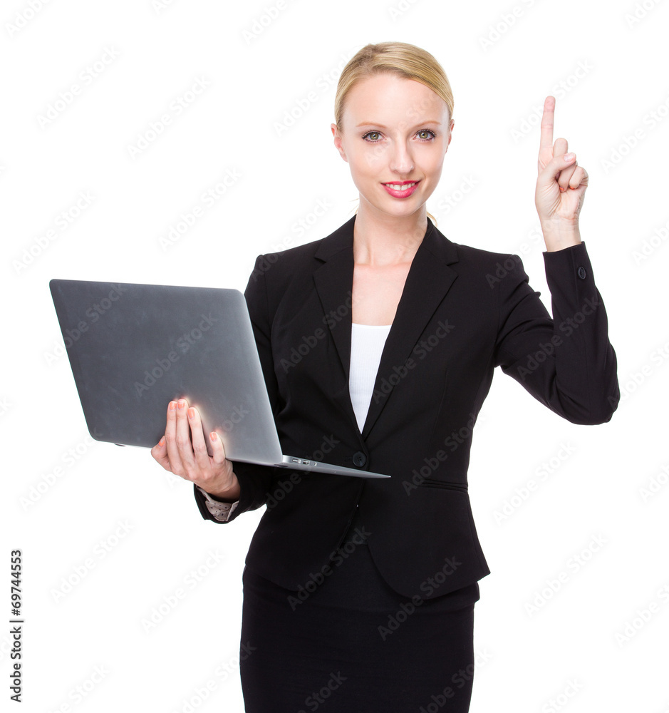 Caucasian businesswoman with notebook and finger up Caucasian businesswoman with notebook and finger up