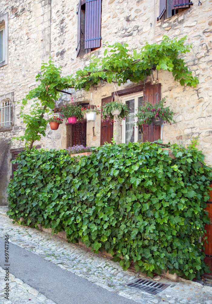 Picturesque rustic street of a quaint hill town in France
