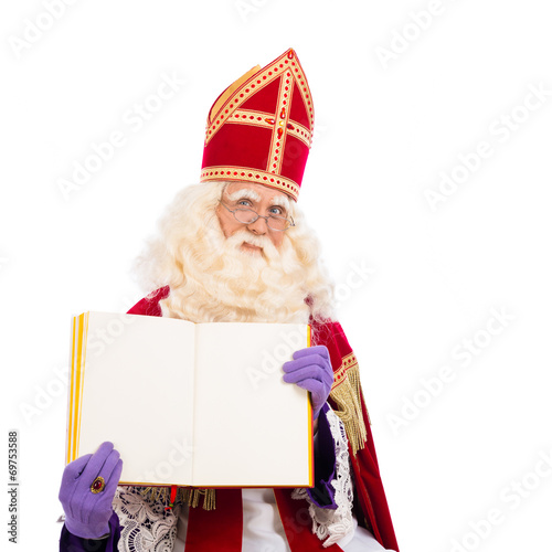 Sinterklaas with book on white background photo