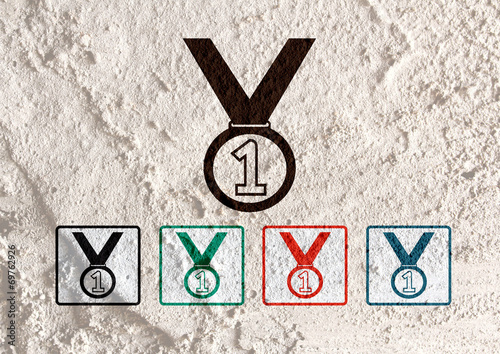 Medal icons on Cement wall Background texture