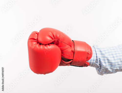 Young businessman with boxing gloves © slasnyi