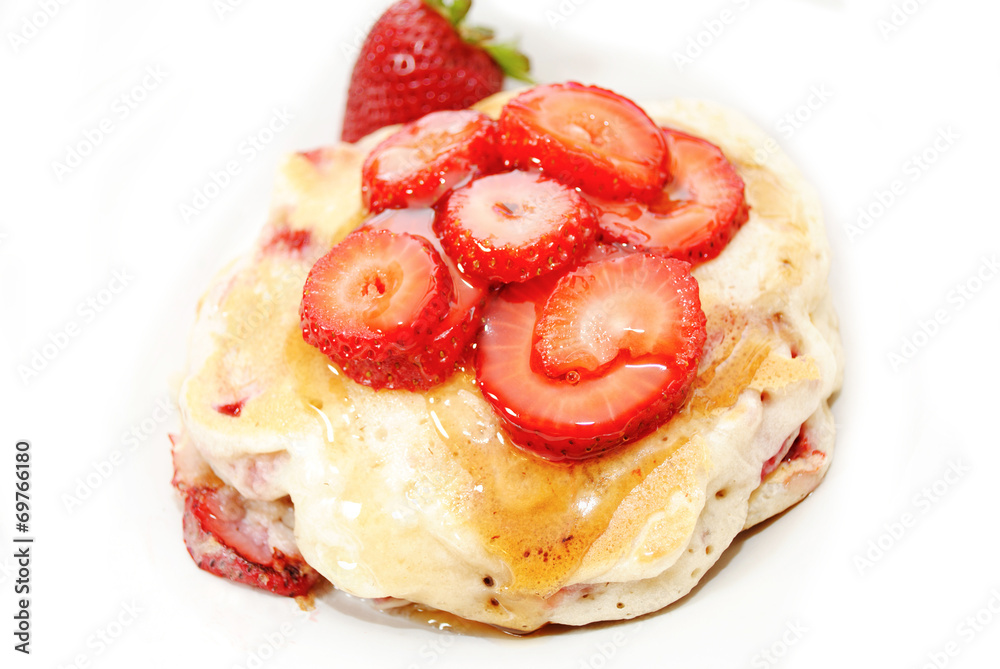 Pancakes Covered with Fresh Strawberries and Syrup Pancakes Covered with Fresh Strawberries and Syrup