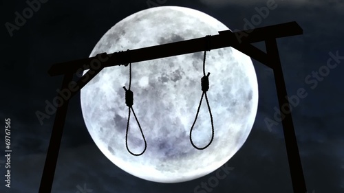 Gallows with the moon in the background.