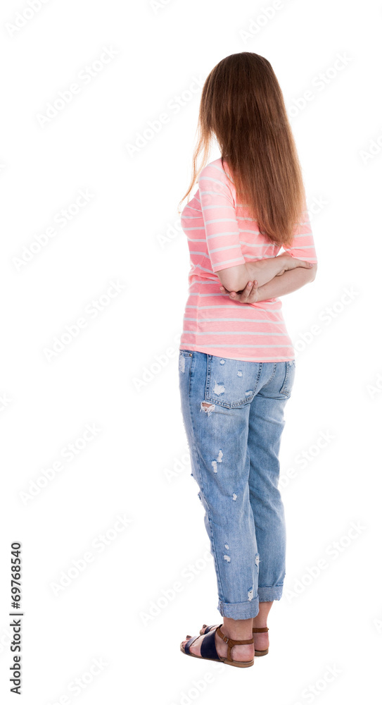 back view of standing young beautiful redhead woman. back view of standing young beautiful redhead woman.