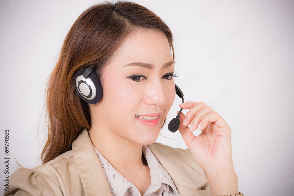 Portrait of happy smiling cheerful support phone operator in hea Portrait of happy smiling cheerful support phone operator in hea