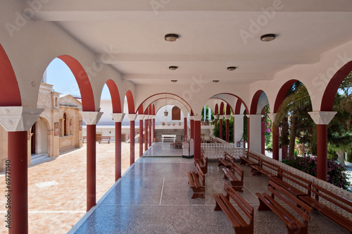 Monastery Panagia Kalyviani arched courtyard on Crete in Greece. photo